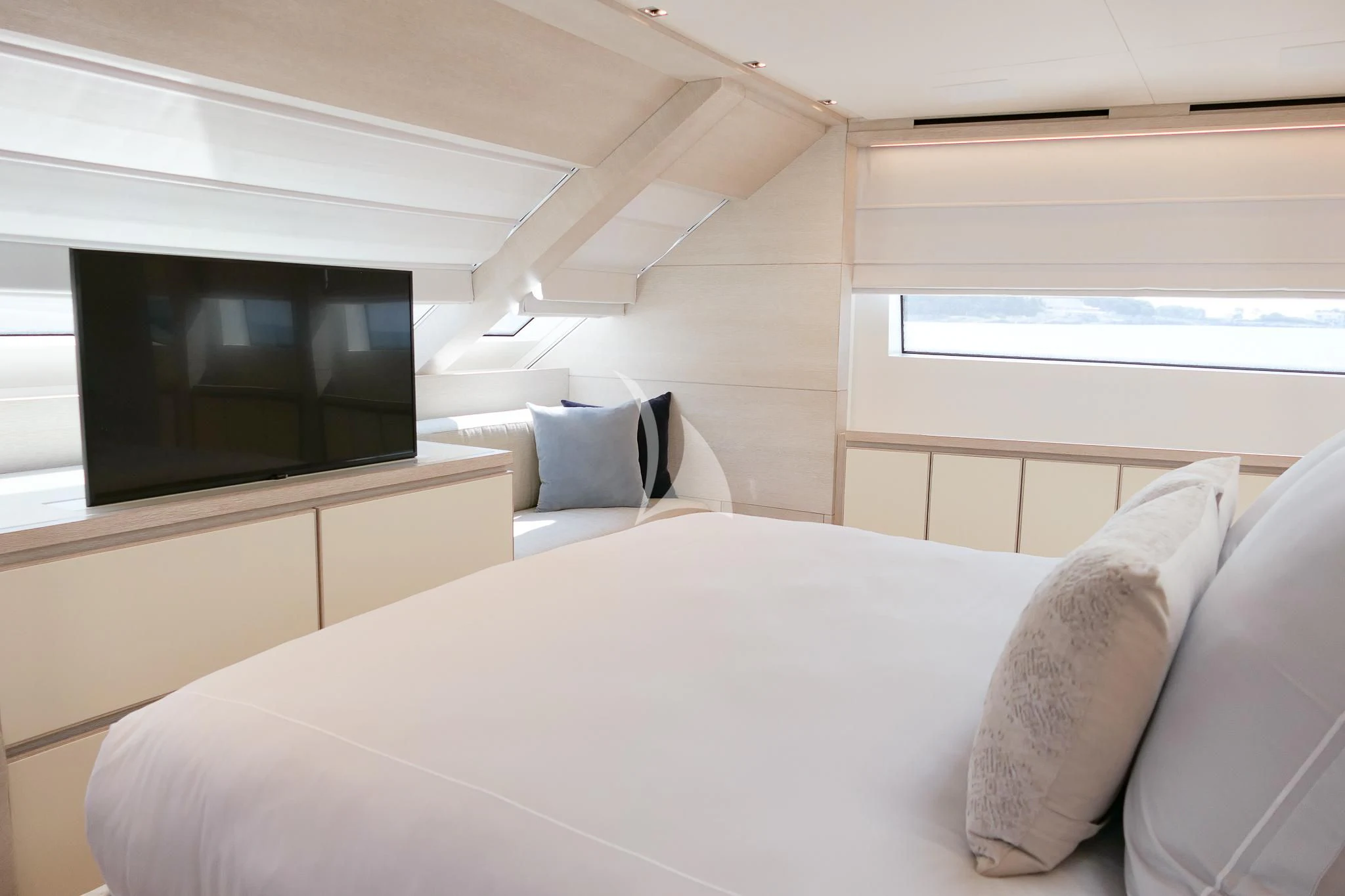 a bed with pillows aboard TINY WAVE Yacht for Sale