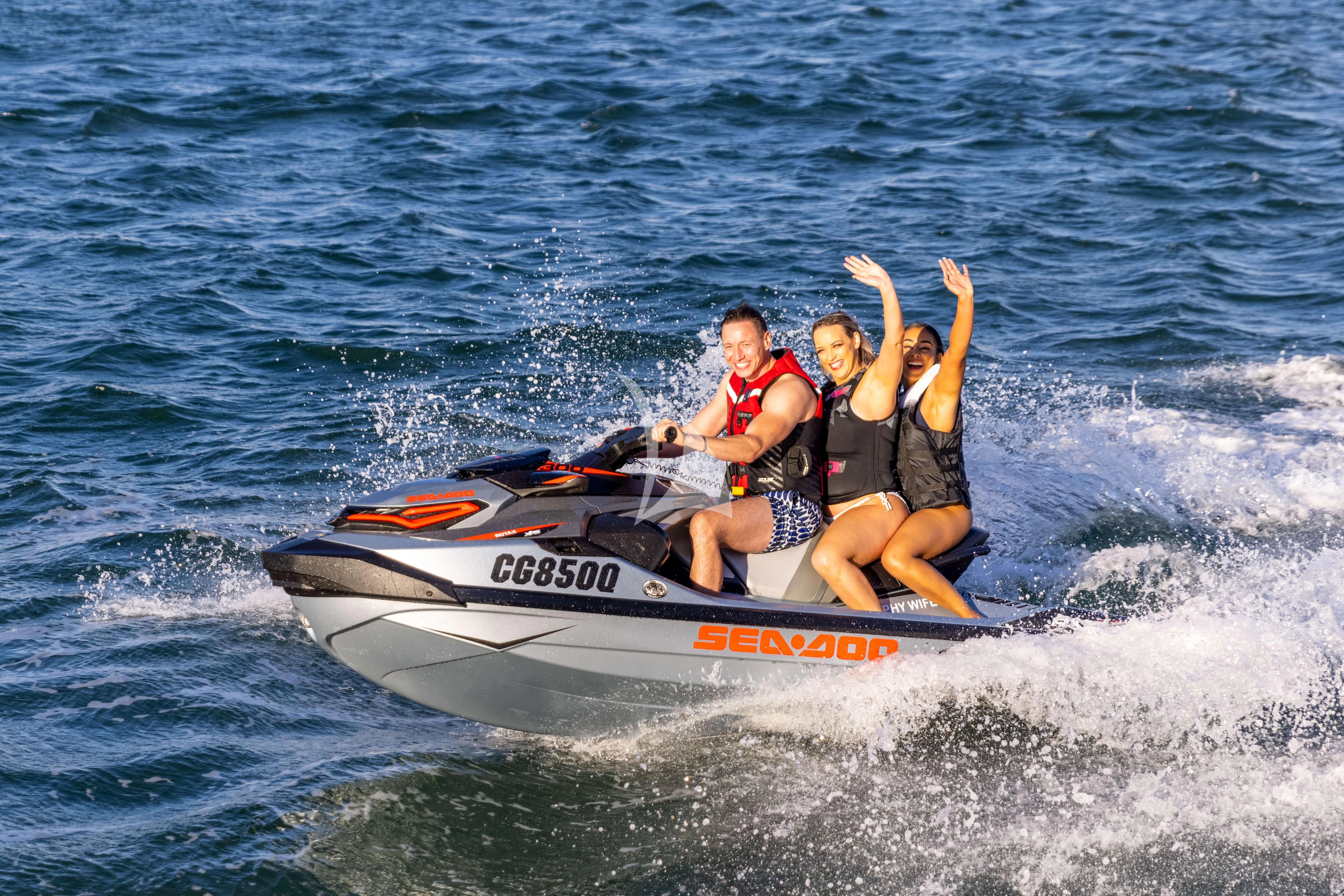 a group of people on a speed boat aboard TINY WAVE Yacht for Sale