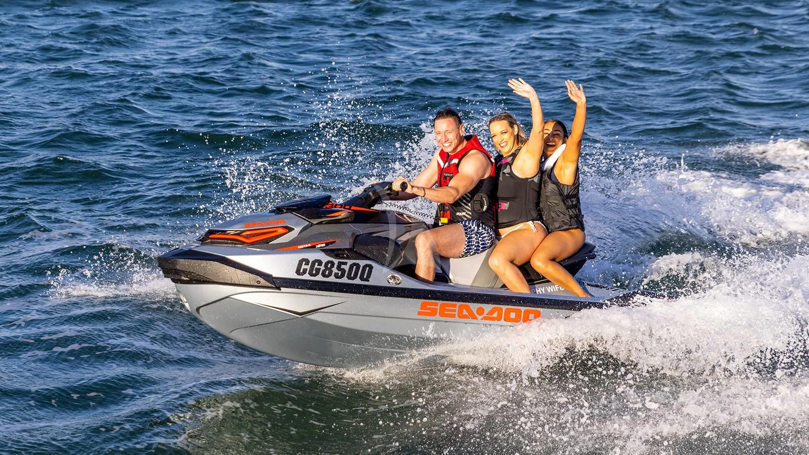 a group of people on a speed boat aboard TINY WAVE Yacht for Sale