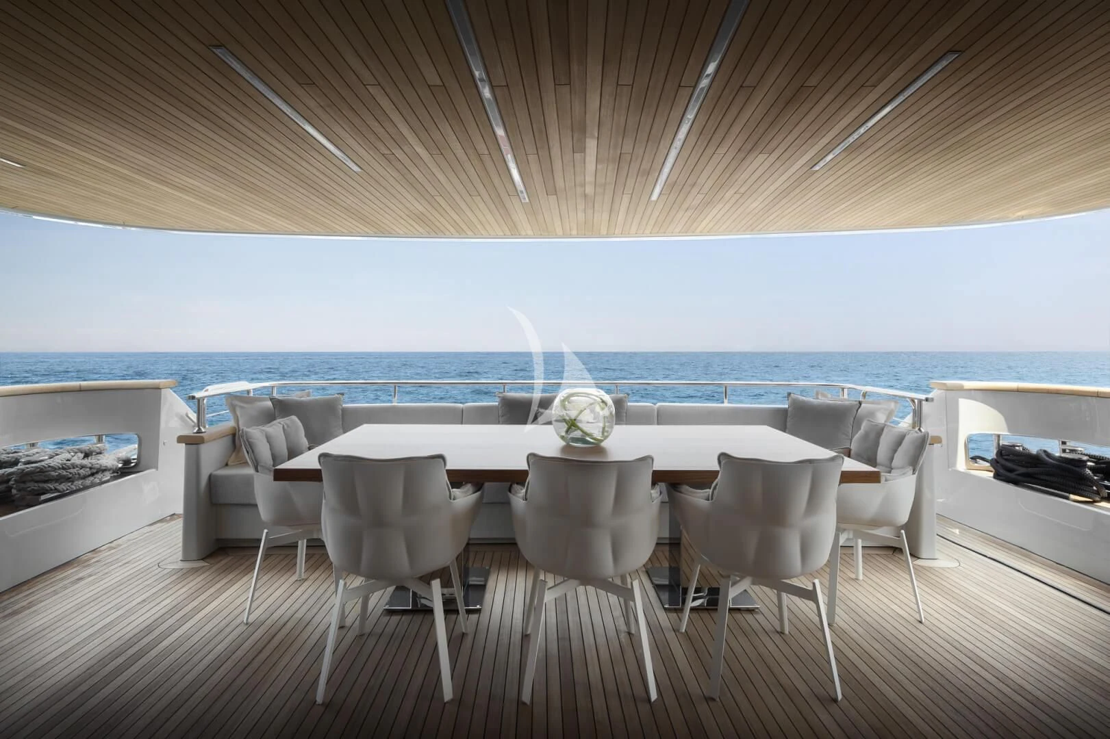 a room with a table and chairs aboard TINY WAVE Yacht for Sale