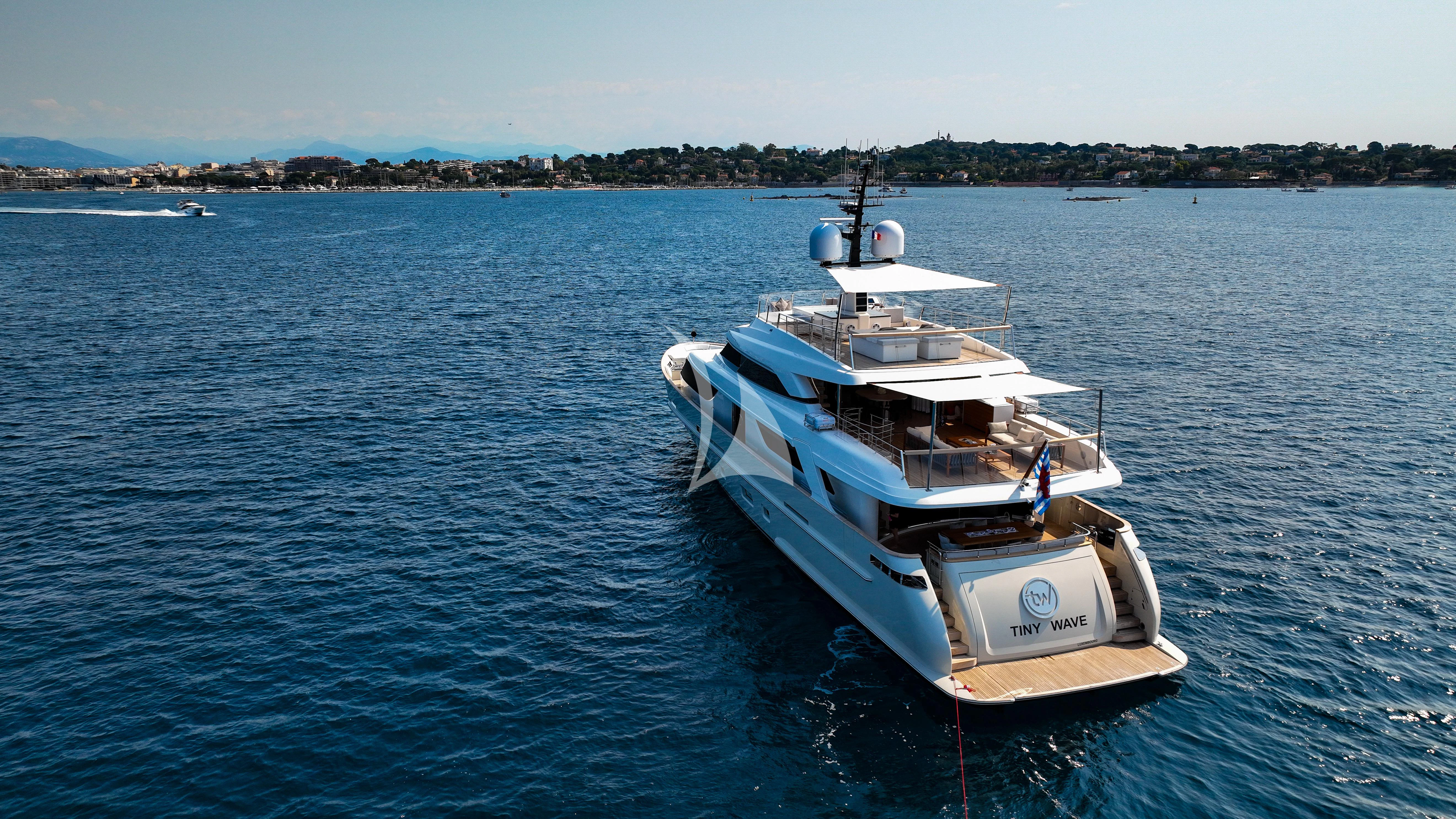 a boat in the water aboard TINY WAVE Yacht for Sale