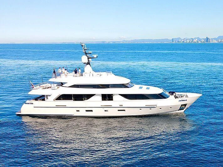 a white yacht in the water aboard TINY WAVE Yacht for Sale
