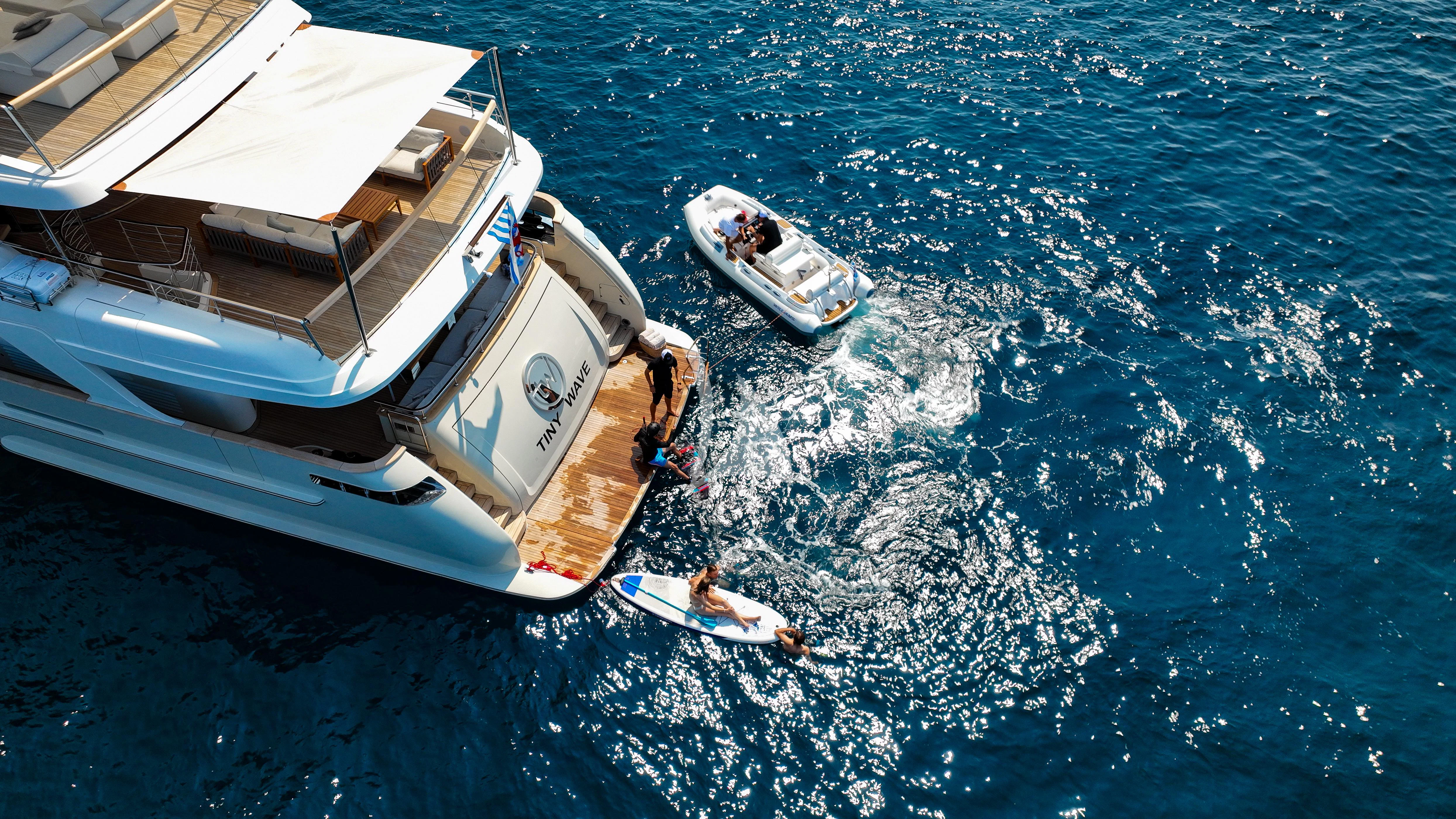 a boat in the water aboard TINY WAVE Yacht for Sale