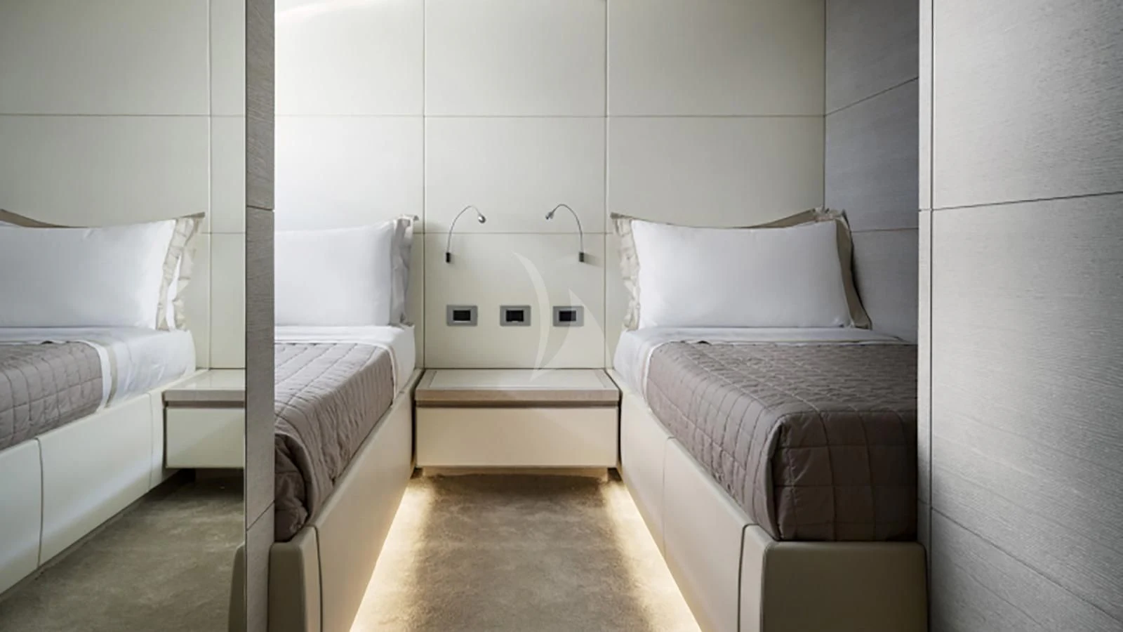 a room with beds and a chair aboard TINY WAVE Yacht for Sale