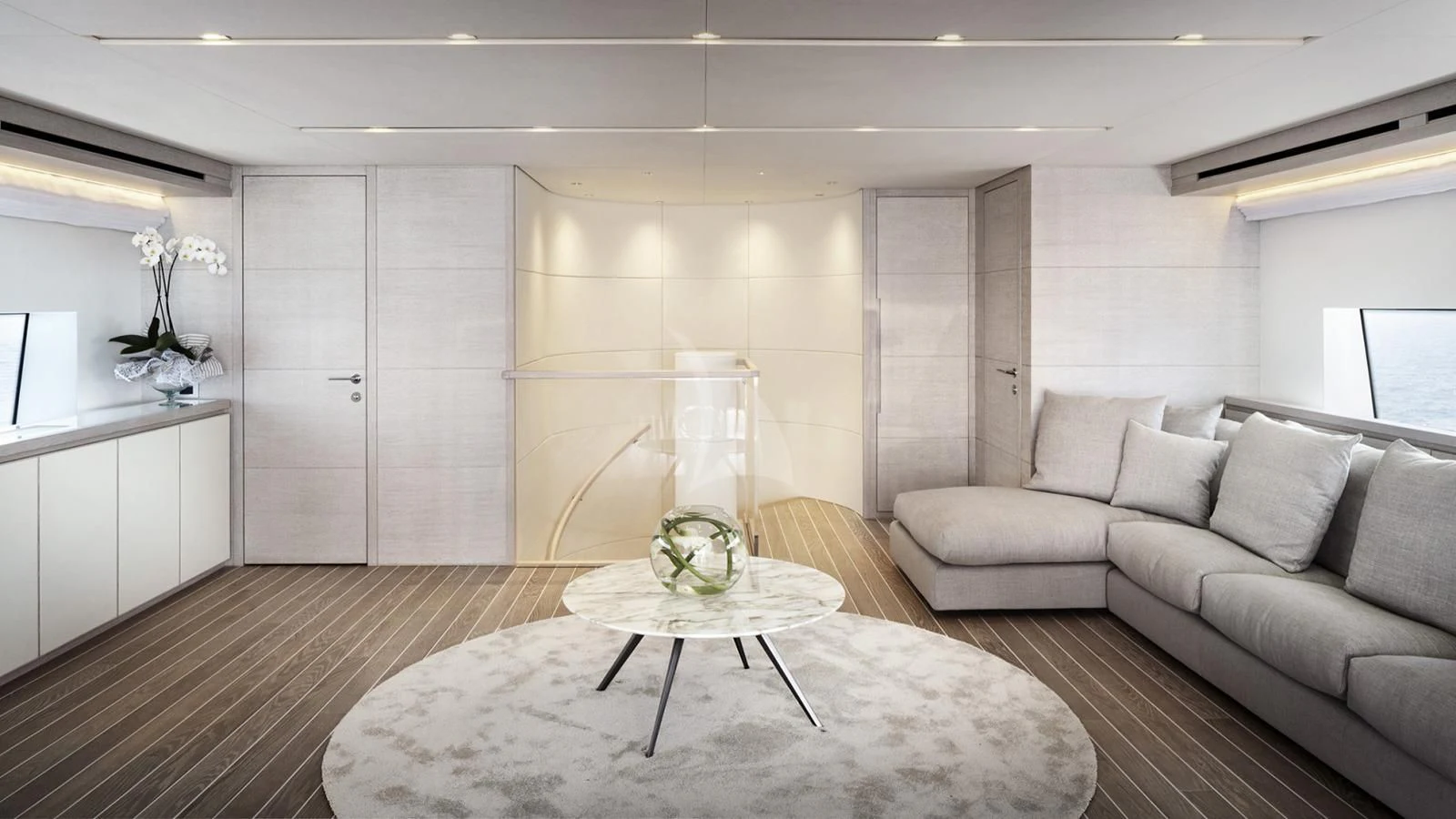 a living room with a table and couches aboard TINY WAVE Yacht for Sale