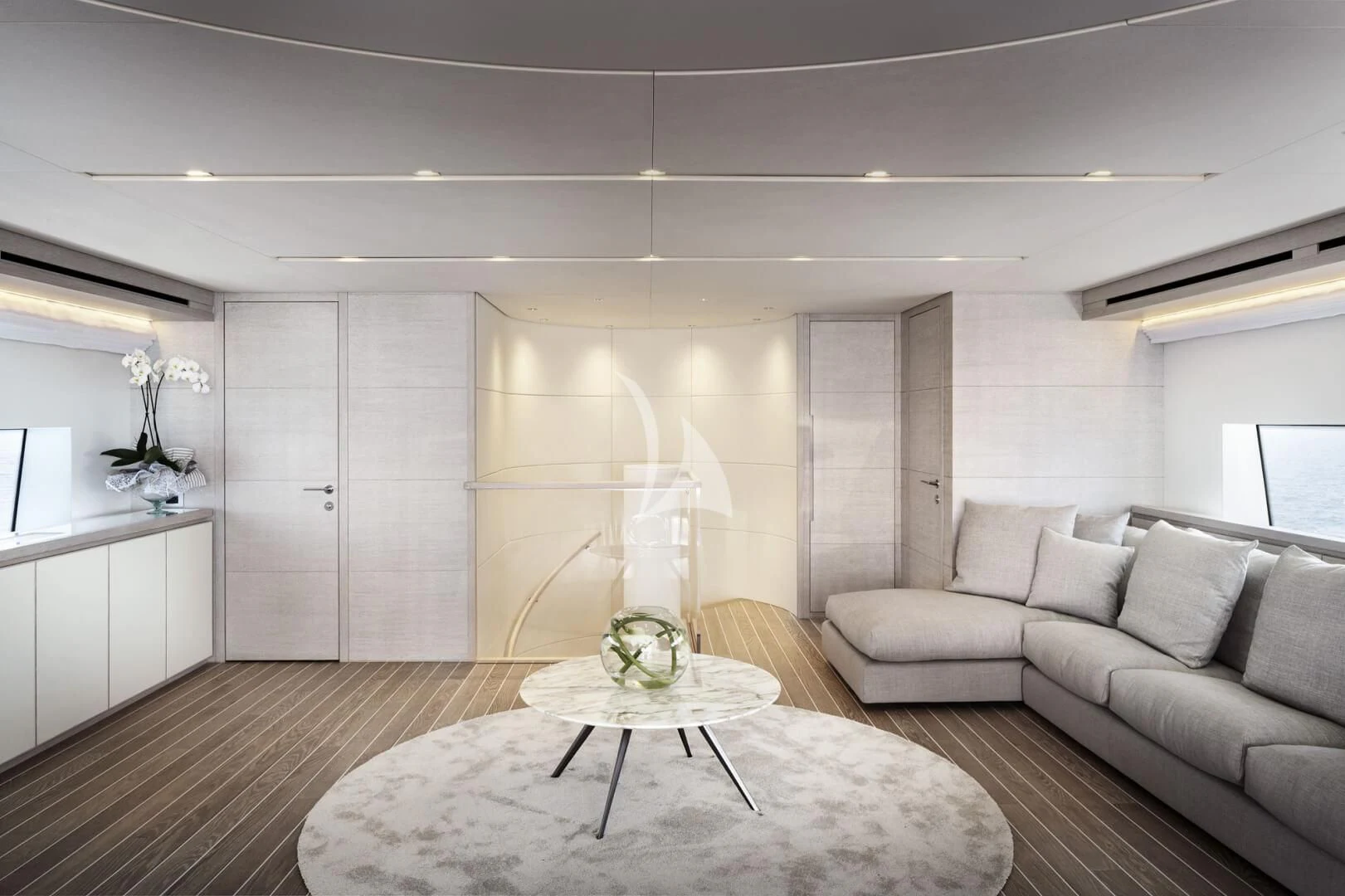 a living room with a large white sofa and a large rug aboard TINY WAVE Yacht for Sale