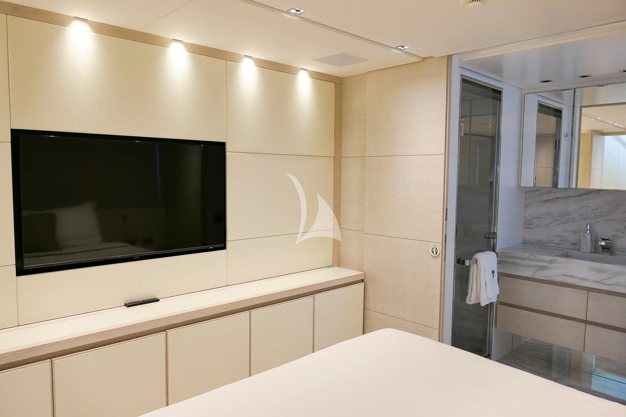 a bathroom with a large mirror aboard TINY WAVE Yacht for Sale