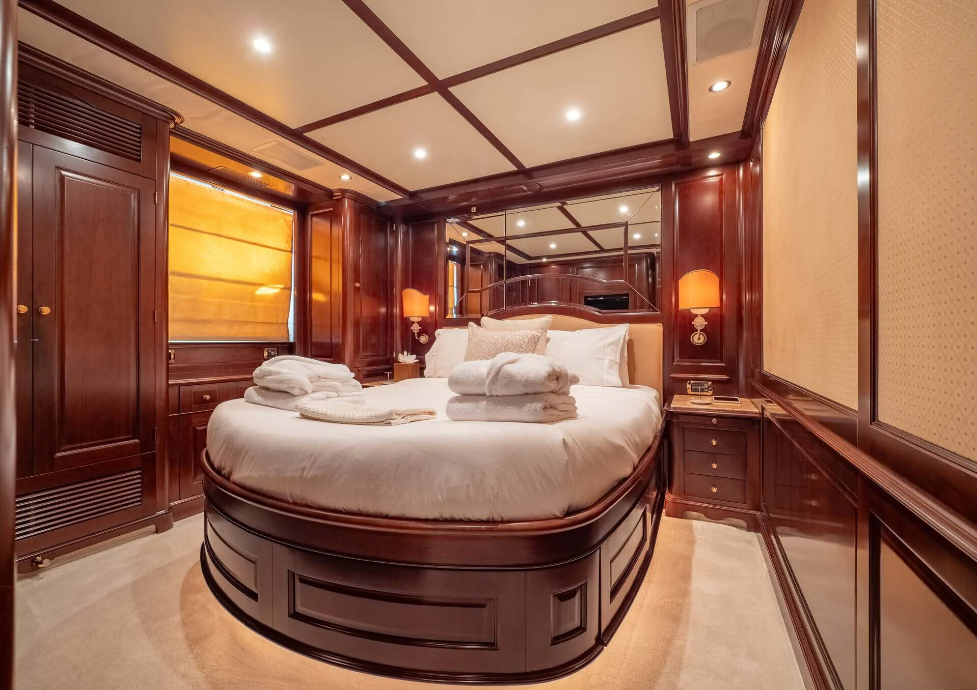 a large bedroom with a large bed aboard GIORGIA I Yacht for Sale