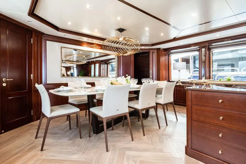 a kitchen with a dining table aboard GIORGIA I Yacht for Sale