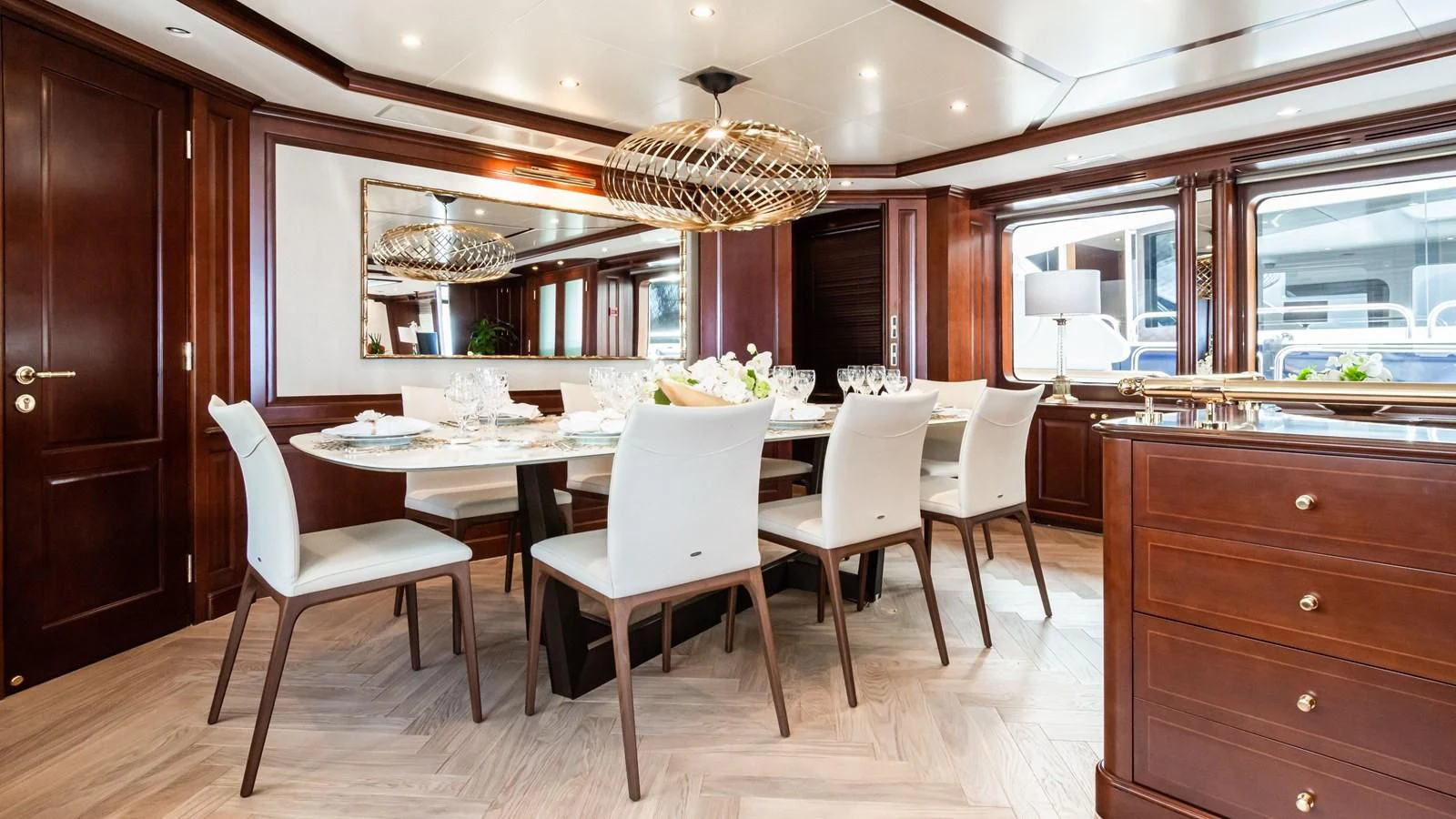 a kitchen with a dining table aboard GIORGIA I Yacht for Sale