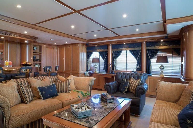 a living room with a large window aboard GIORGIA I Yacht for Sale