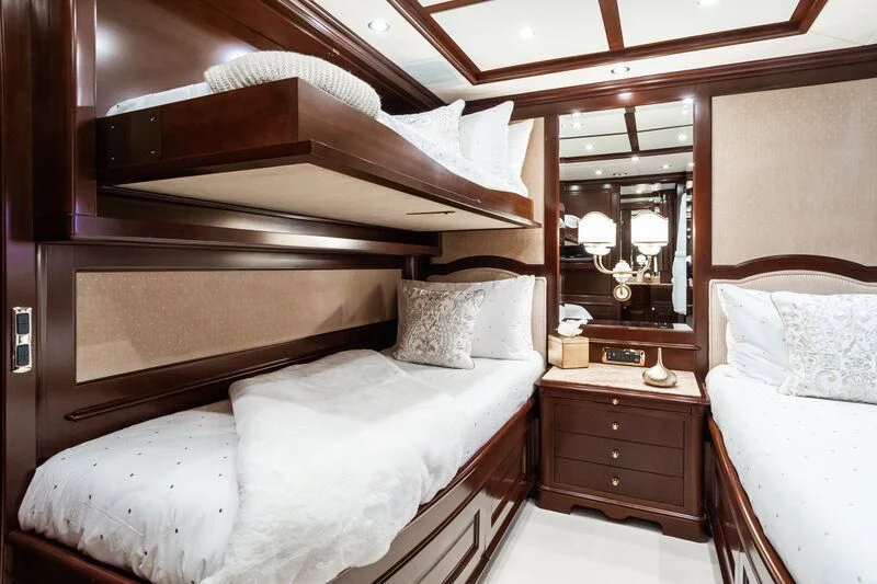 a room with a bed and a mirror aboard GIORGIA I Yacht for Sale