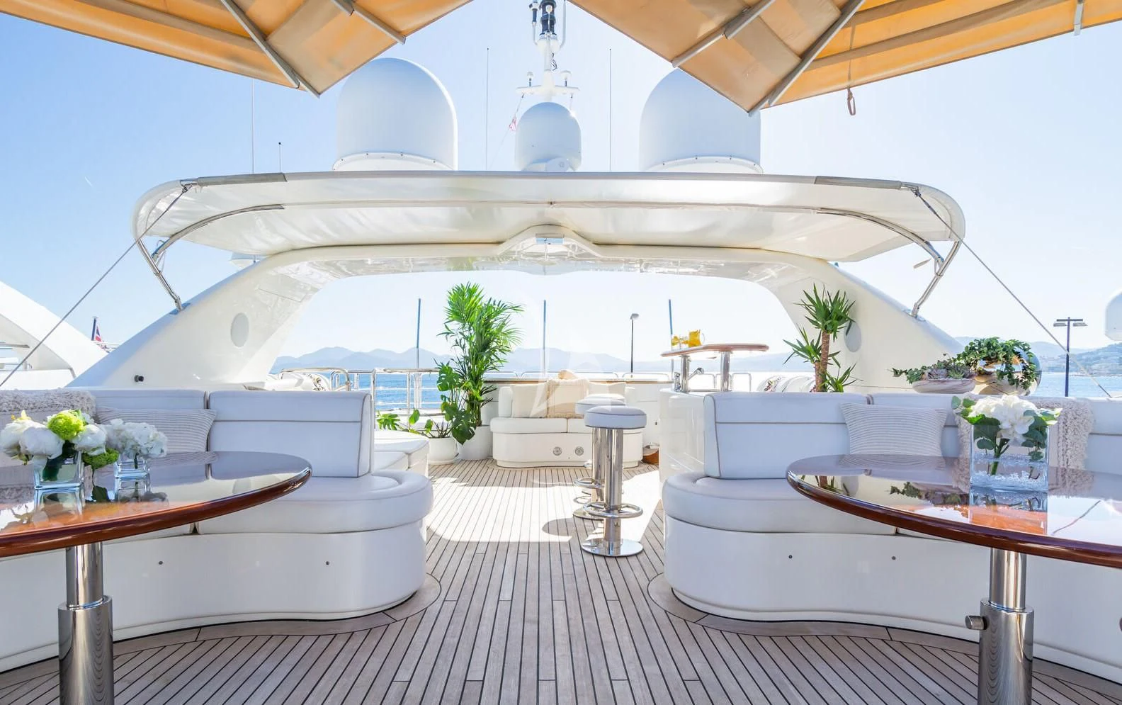 a room with tables and chairs aboard GIORGIA I Yacht for Sale