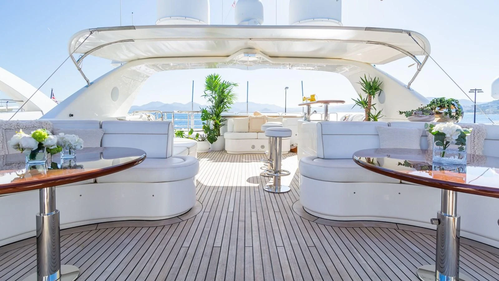 a room with a table and chairs aboard GIORGIA I Yacht for Sale
