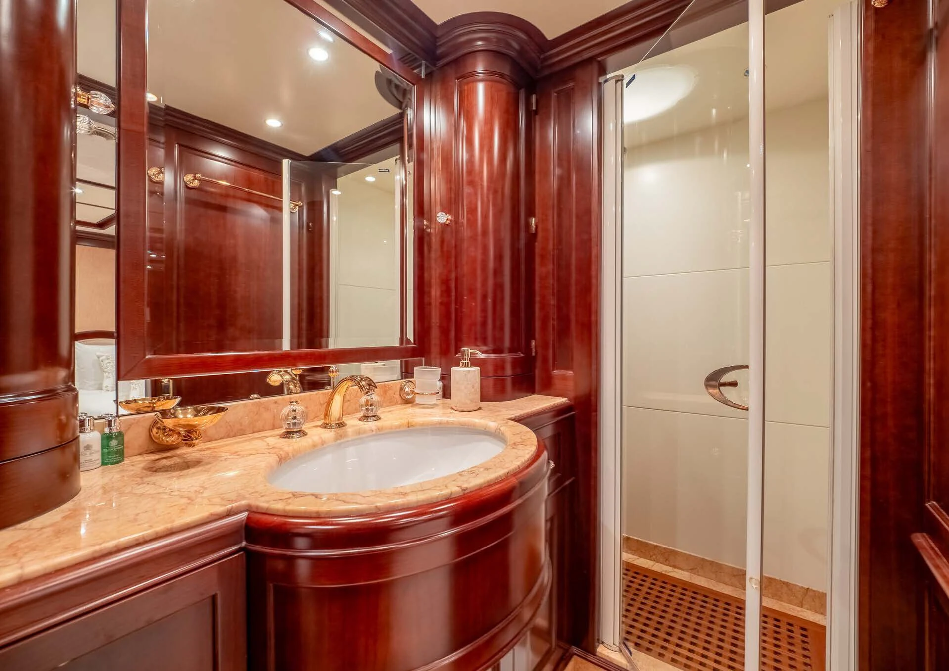 a bathroom with a sink and a mirror aboard GIORGIA I Yacht for Sale