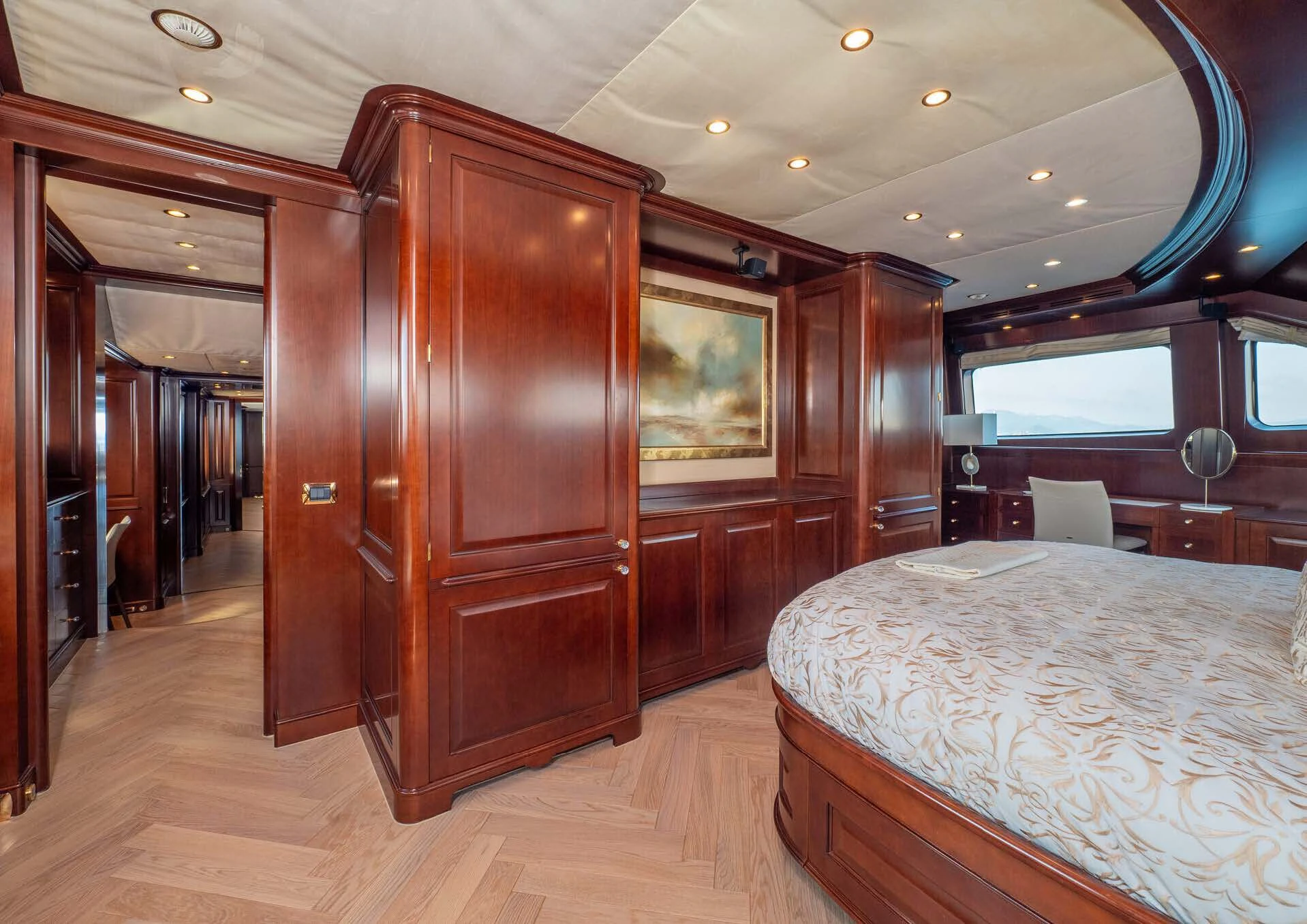 a bedroom with a bed and a closet aboard GIORGIA I Yacht for Sale