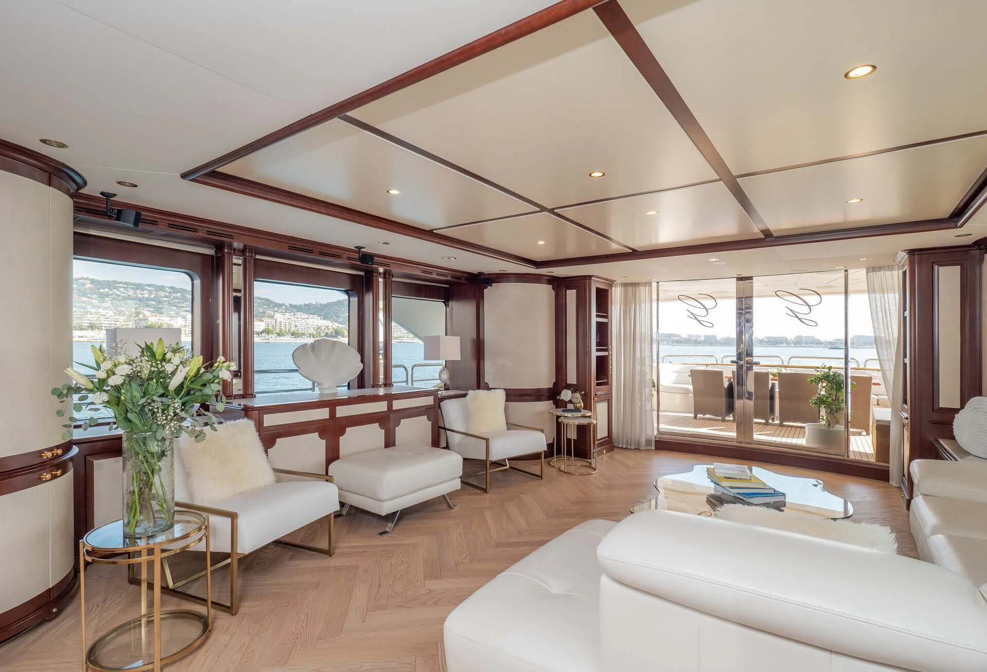 a living room with a large window aboard GIORGIA I Yacht for Sale