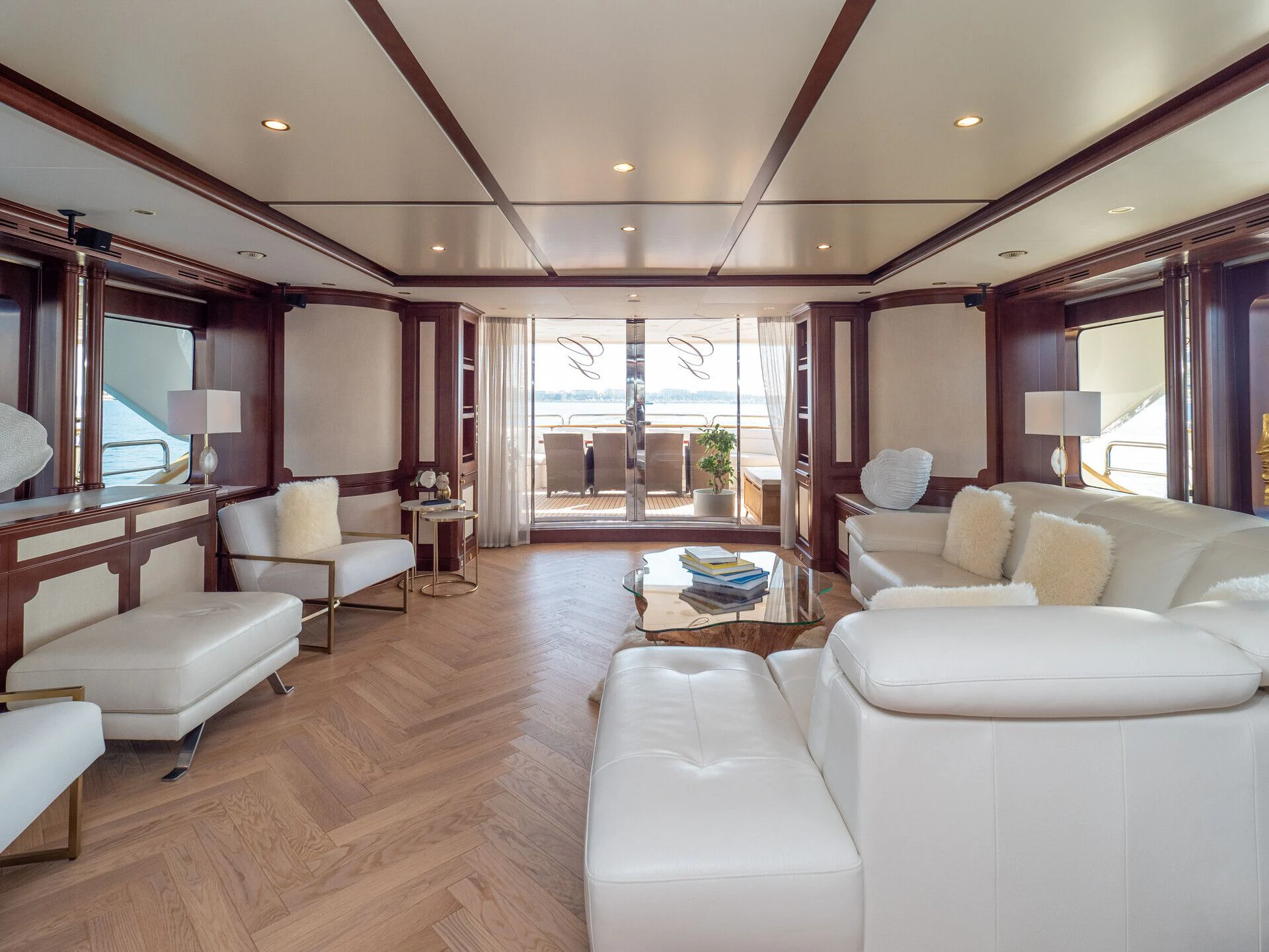 a living room with a large window aboard GIORGIA I Yacht for Sale