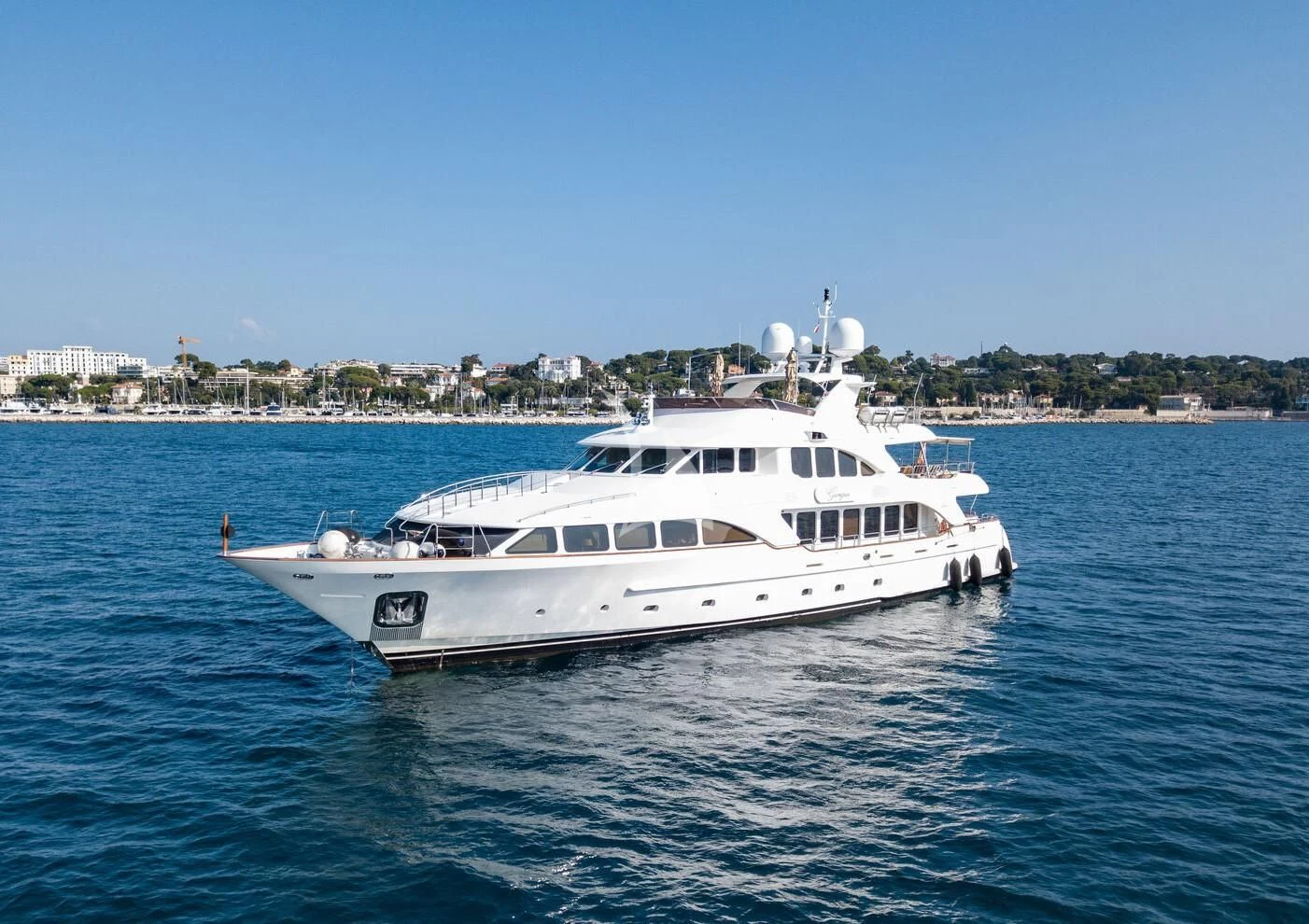 a white boat on the water aboard GIORGIA I Yacht for Sale
