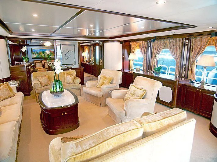 a large living room with a large window aboard GIORGIA I Yacht for Sale