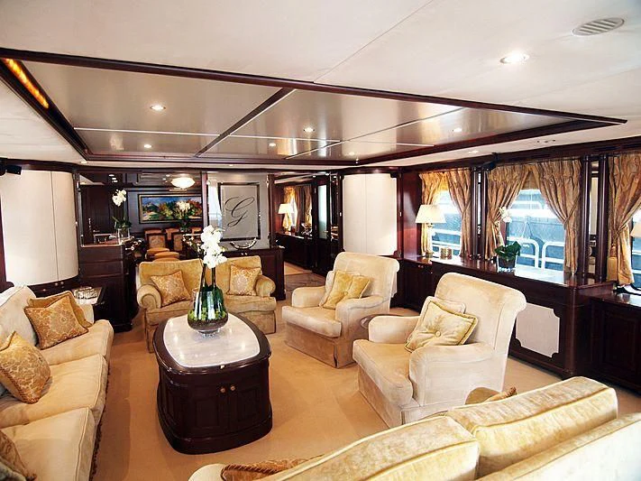 a living room with a large window aboard GIORGIA I Yacht for Sale