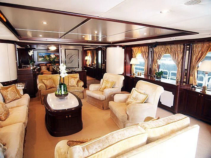 a large living room with a large window aboard GIORGIA I Yacht for Sale