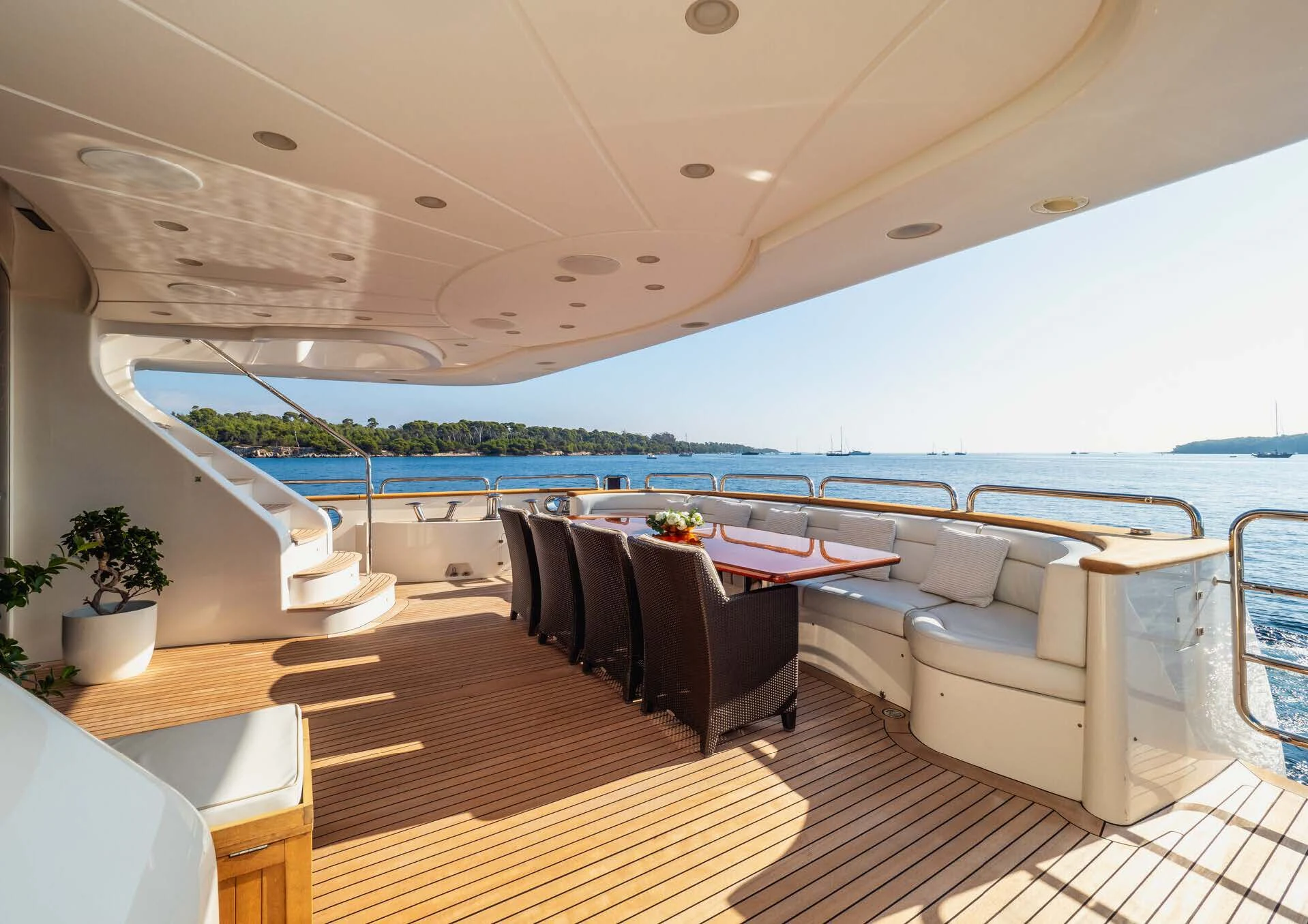 a room with a table and chairs aboard GIORGIA I Yacht for Sale