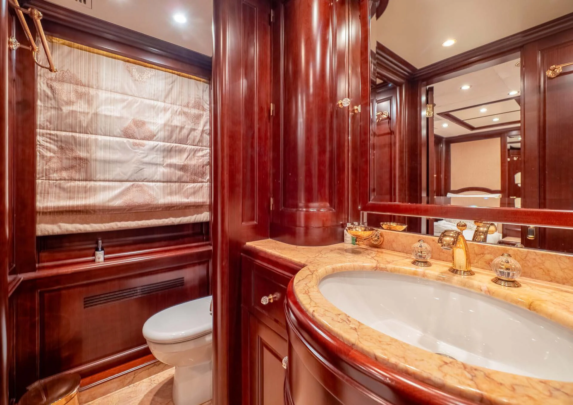 a bathroom with a sink and toilet aboard GIORGIA I Yacht for Sale