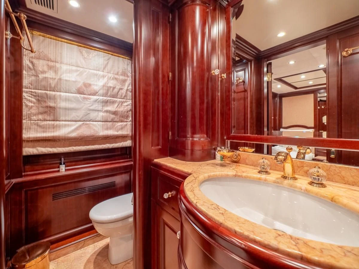 a bathroom with a sink and a toilet aboard GIORGIA I Yacht for Sale