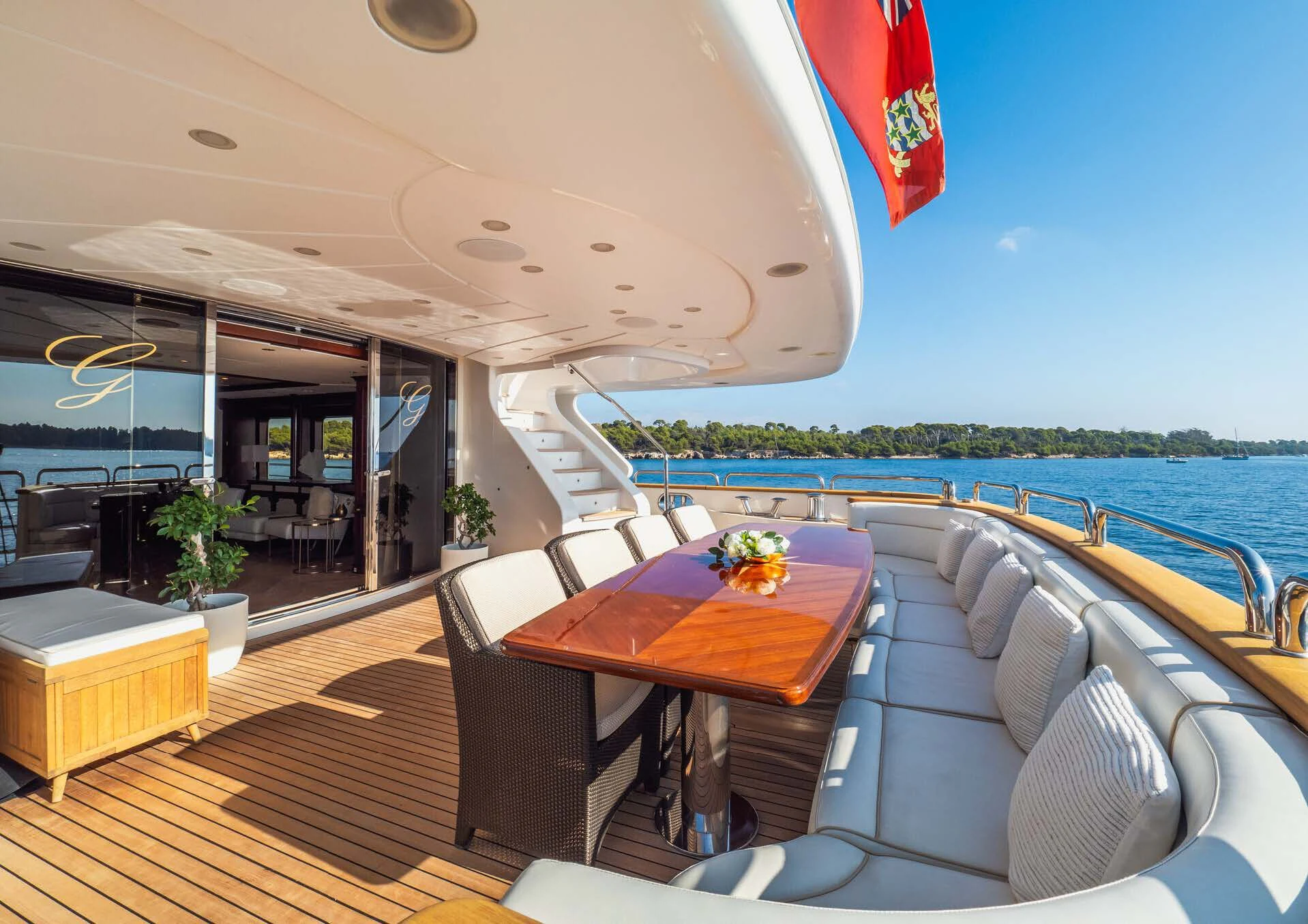 a room with a table and chairs aboard GIORGIA I Yacht for Sale
