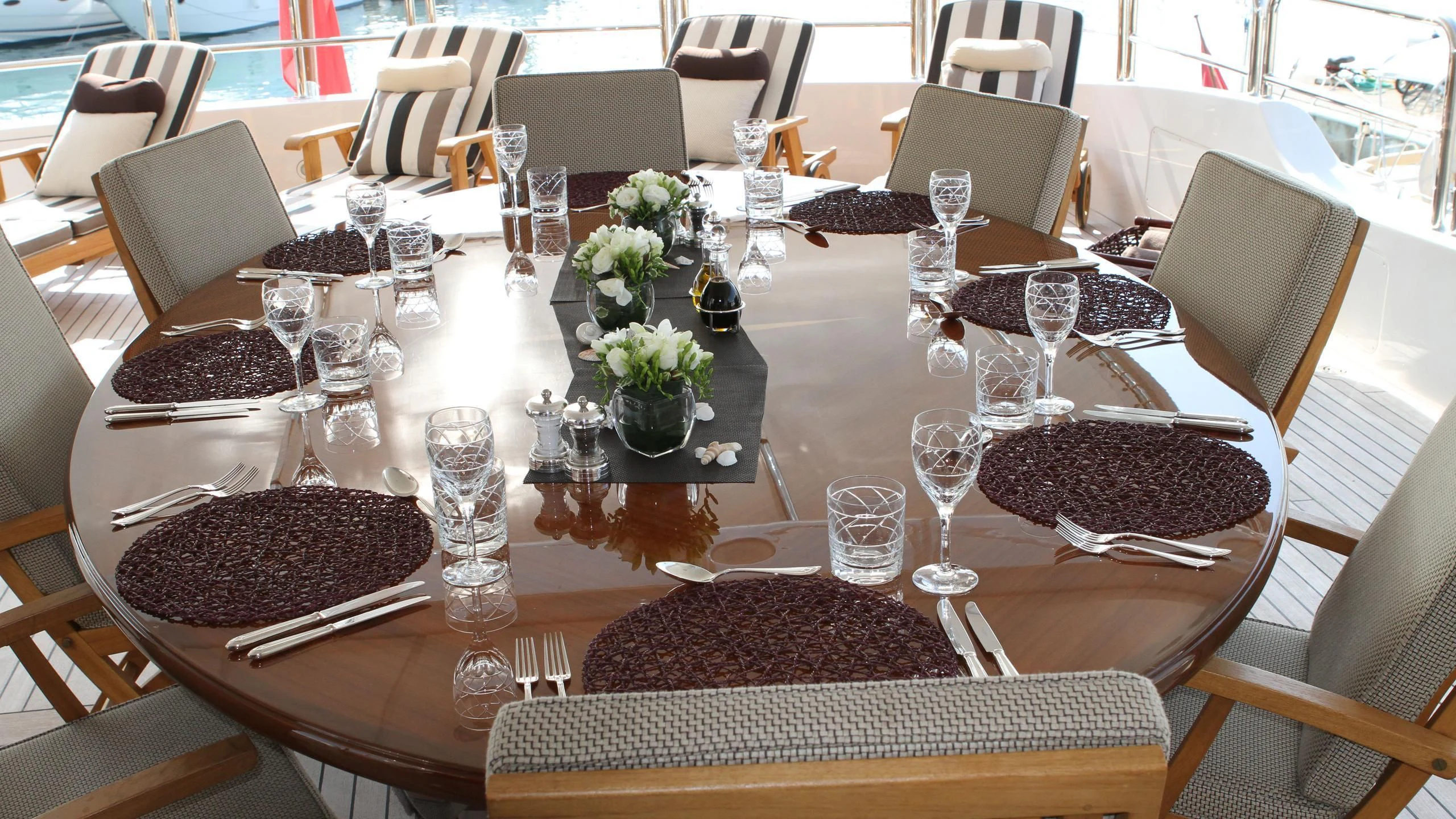 a table set with place settings aboard GIORGIA I Yacht for Sale
