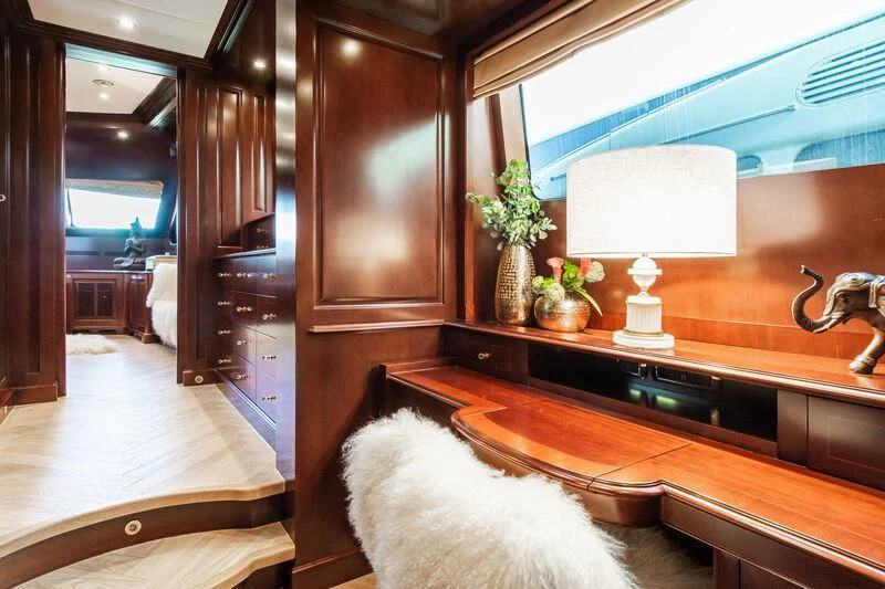 a dog sitting in a kitchen aboard GIORGIA I Yacht for Sale