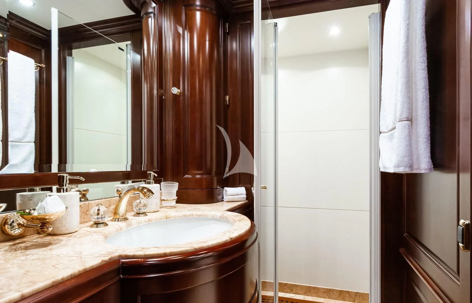 a bathroom with a sink and mirror aboard GIORGIA I Yacht for Sale