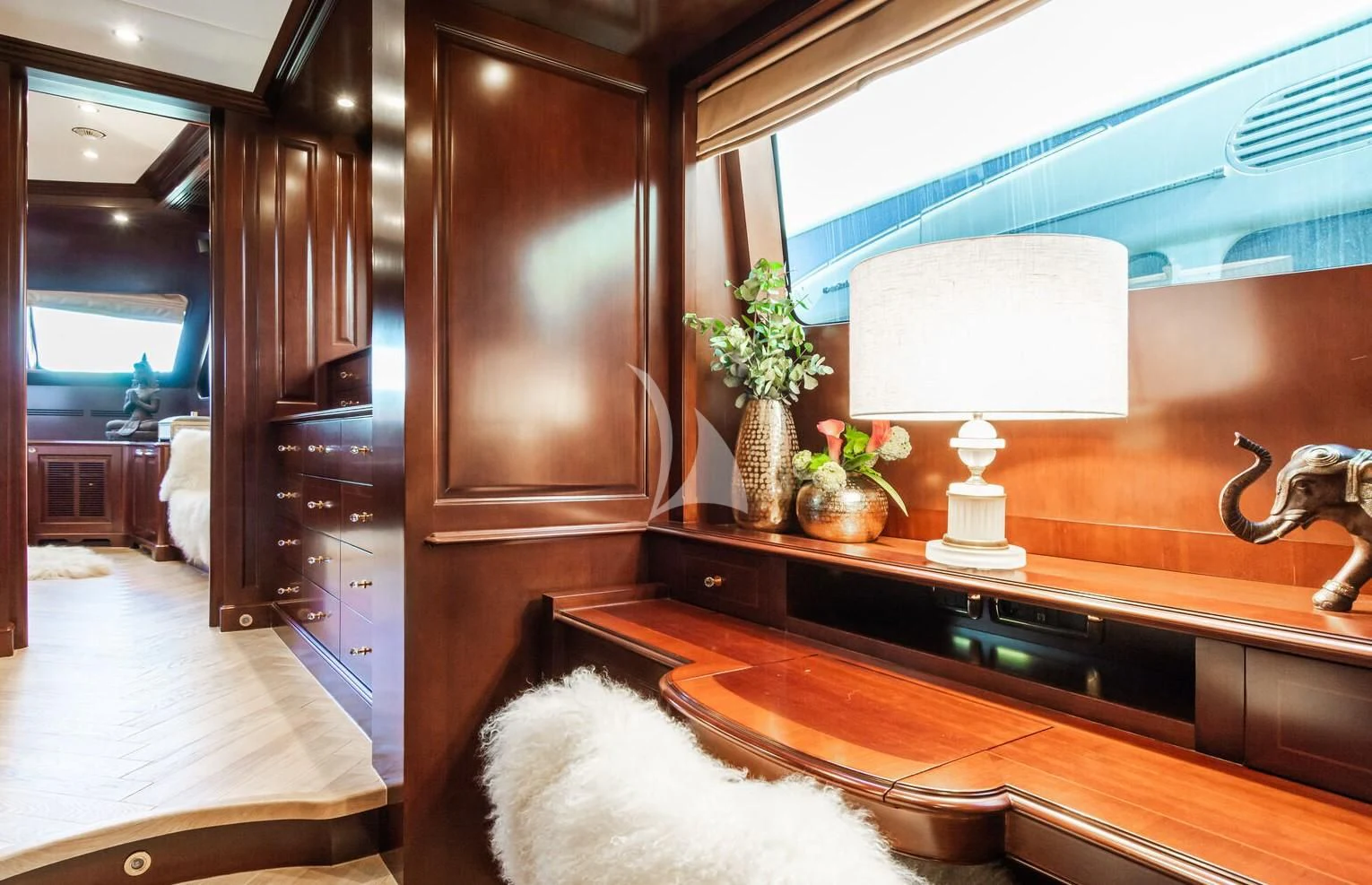 a large bathroom with a large mirror aboard GIORGIA I Yacht for Sale