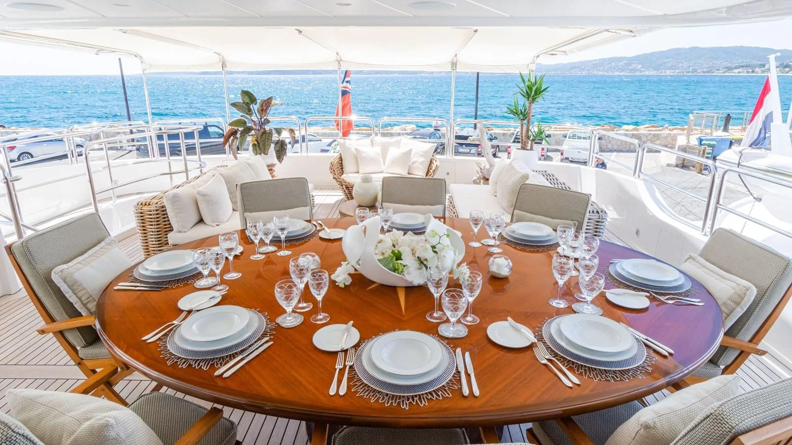a table set for a dinner party aboard GIORGIA I Yacht for Sale