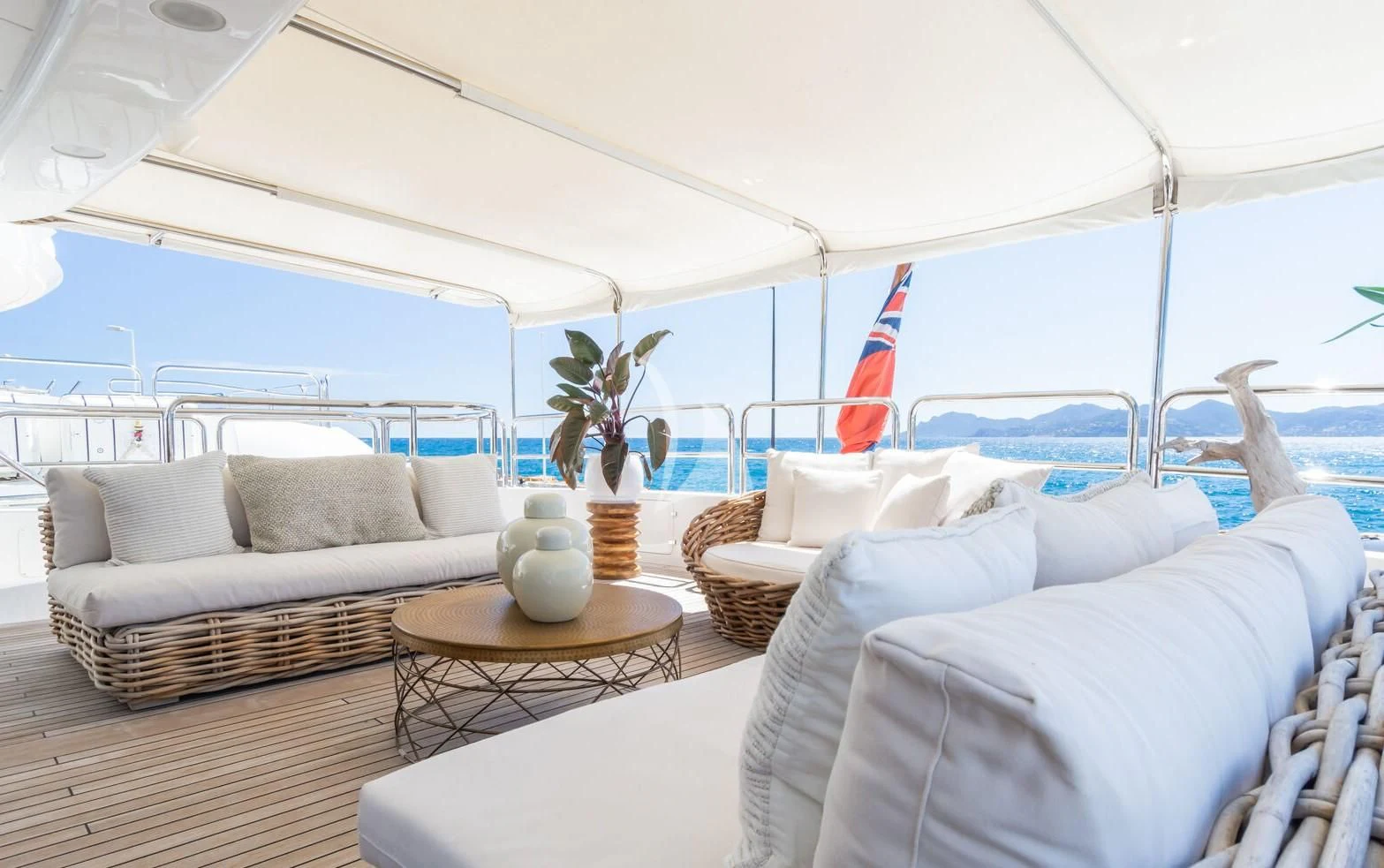 a white tent with a white couch and a white sofa aboard GIORGIA I Yacht for Sale