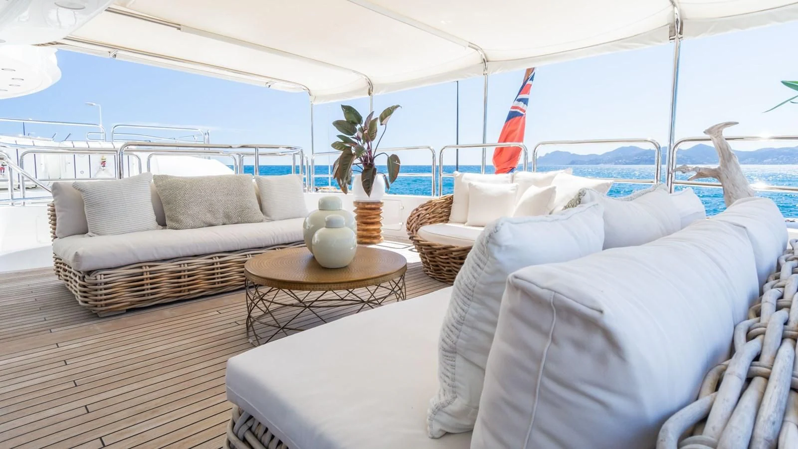 a large white tent with a couch and a table aboard GIORGIA I Yacht for Sale