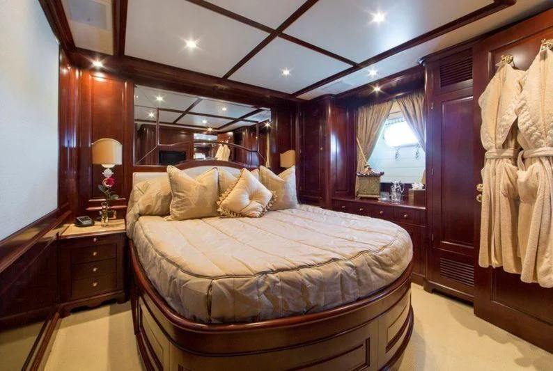 a bed with a canopy aboard GIORGIA I Yacht for Sale