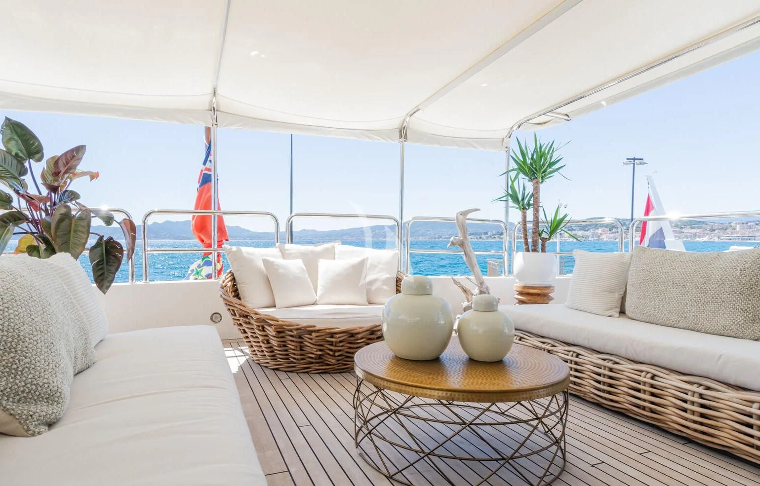 a living room with a large window aboard GIORGIA I Yacht for Sale