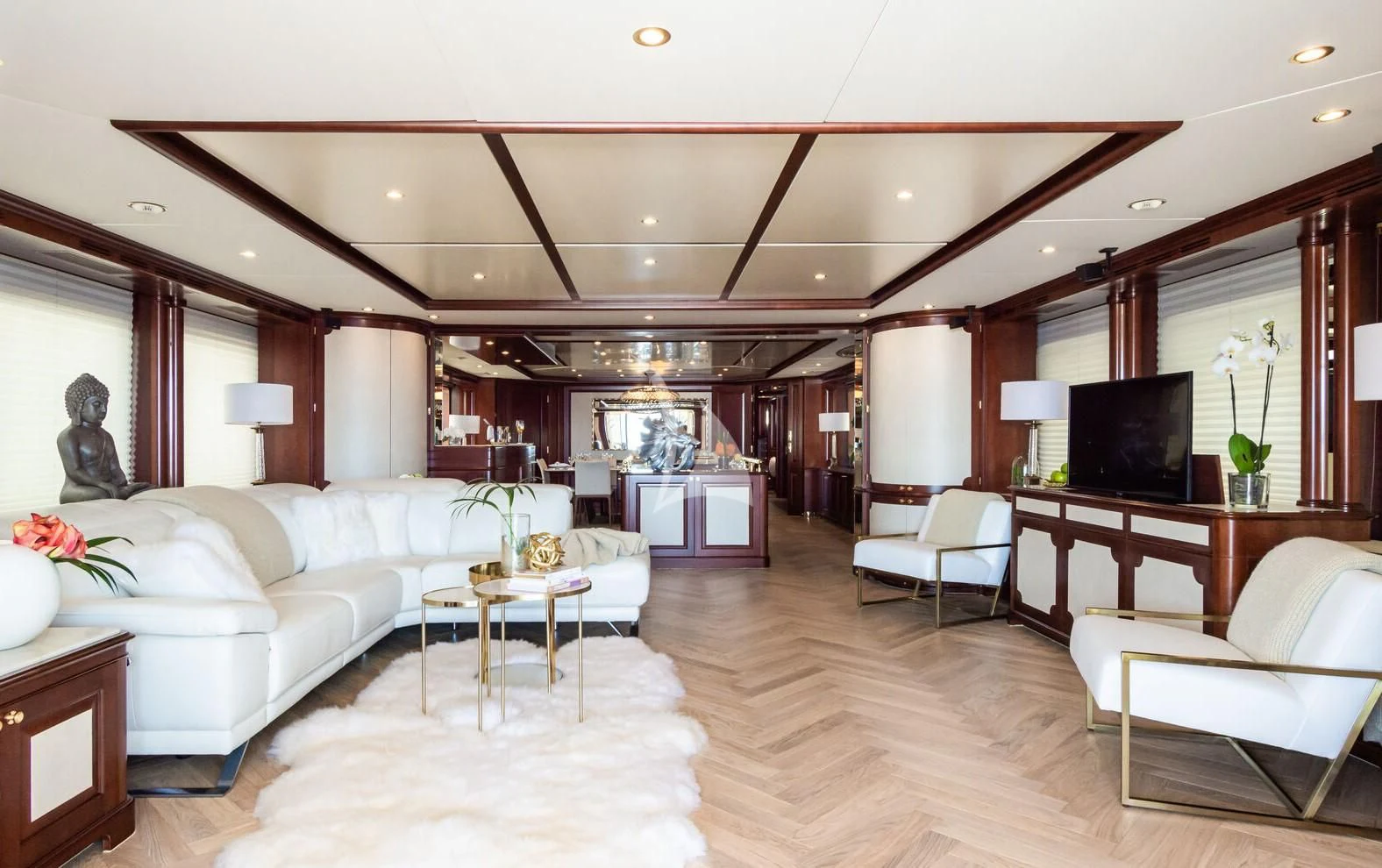 a living room with a large mirror aboard GIORGIA I Yacht for Sale
