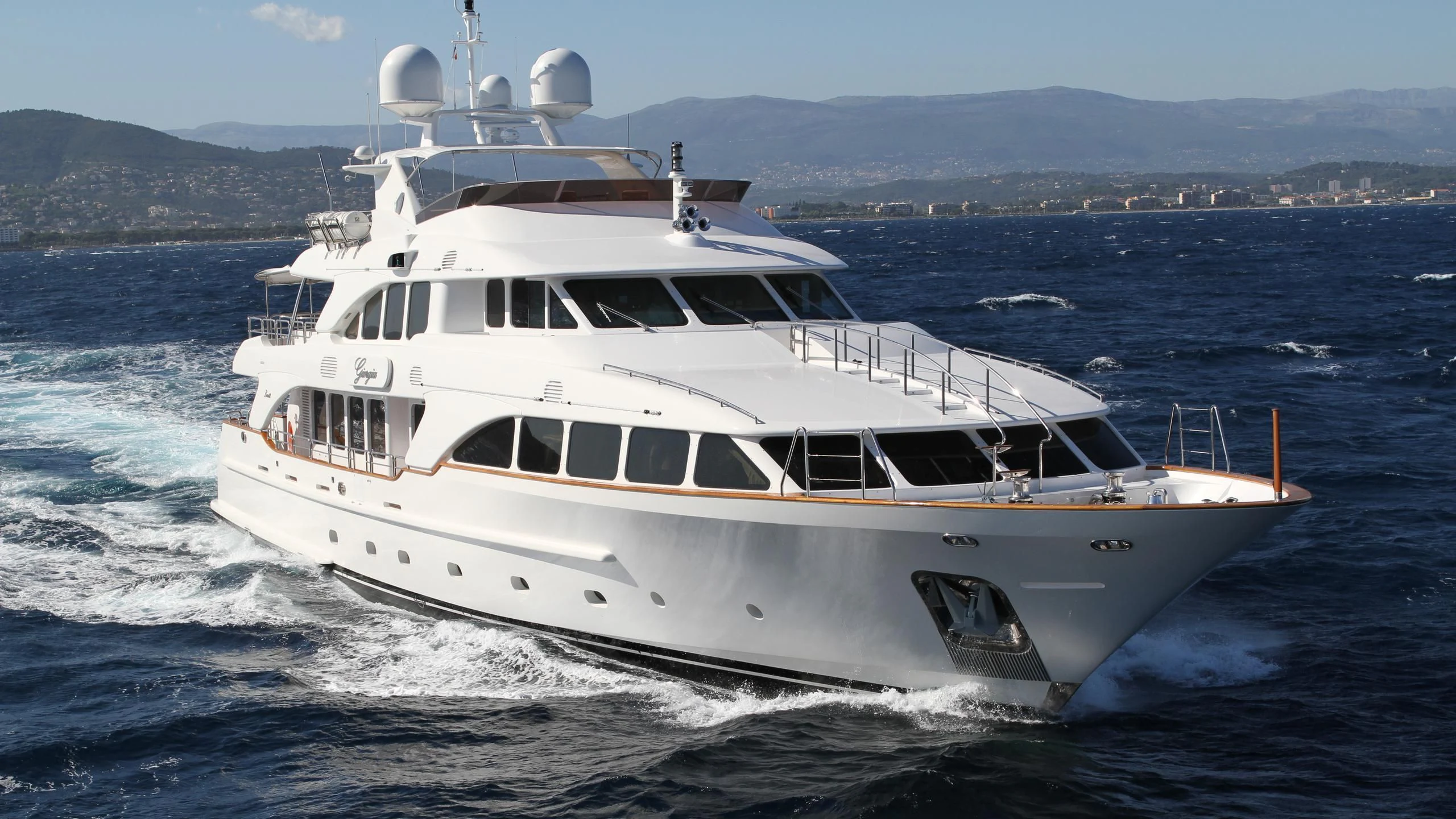 a white boat on the water aboard GIORGIA I Yacht for Sale