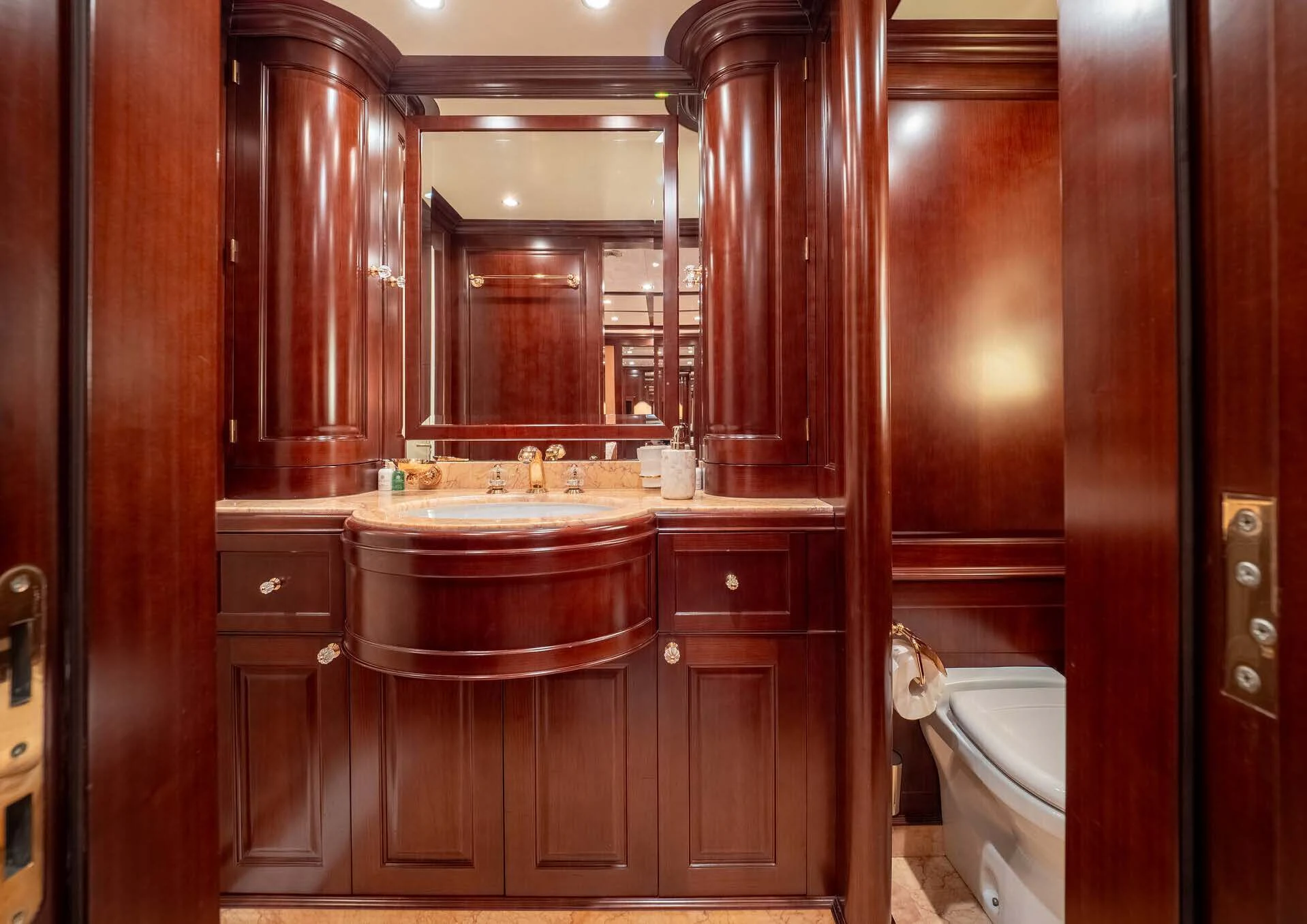 a bathroom with a sink and a toilet aboard GIORGIA I Yacht for Sale