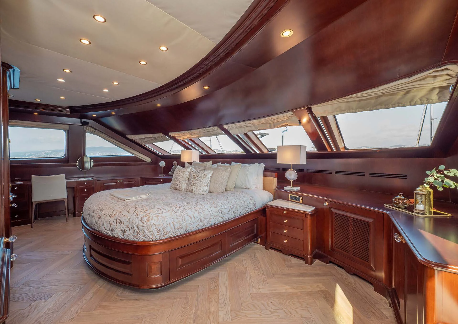 a bedroom with a large bed aboard GIORGIA I Yacht for Sale
