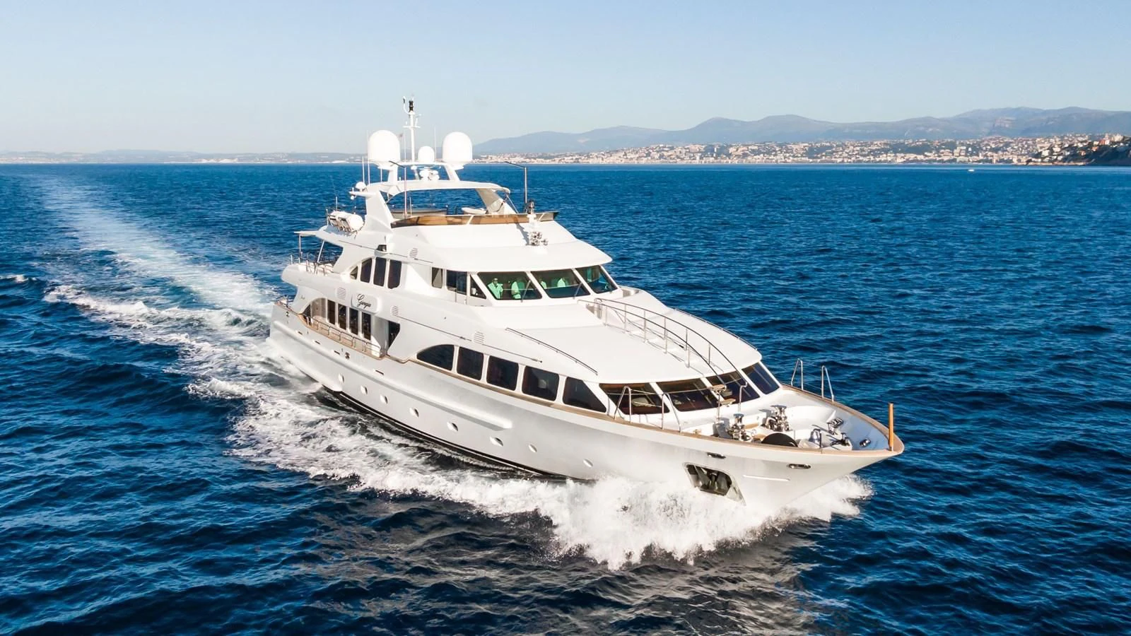 a white yacht on the water aboard GIORGIA I Yacht for Sale