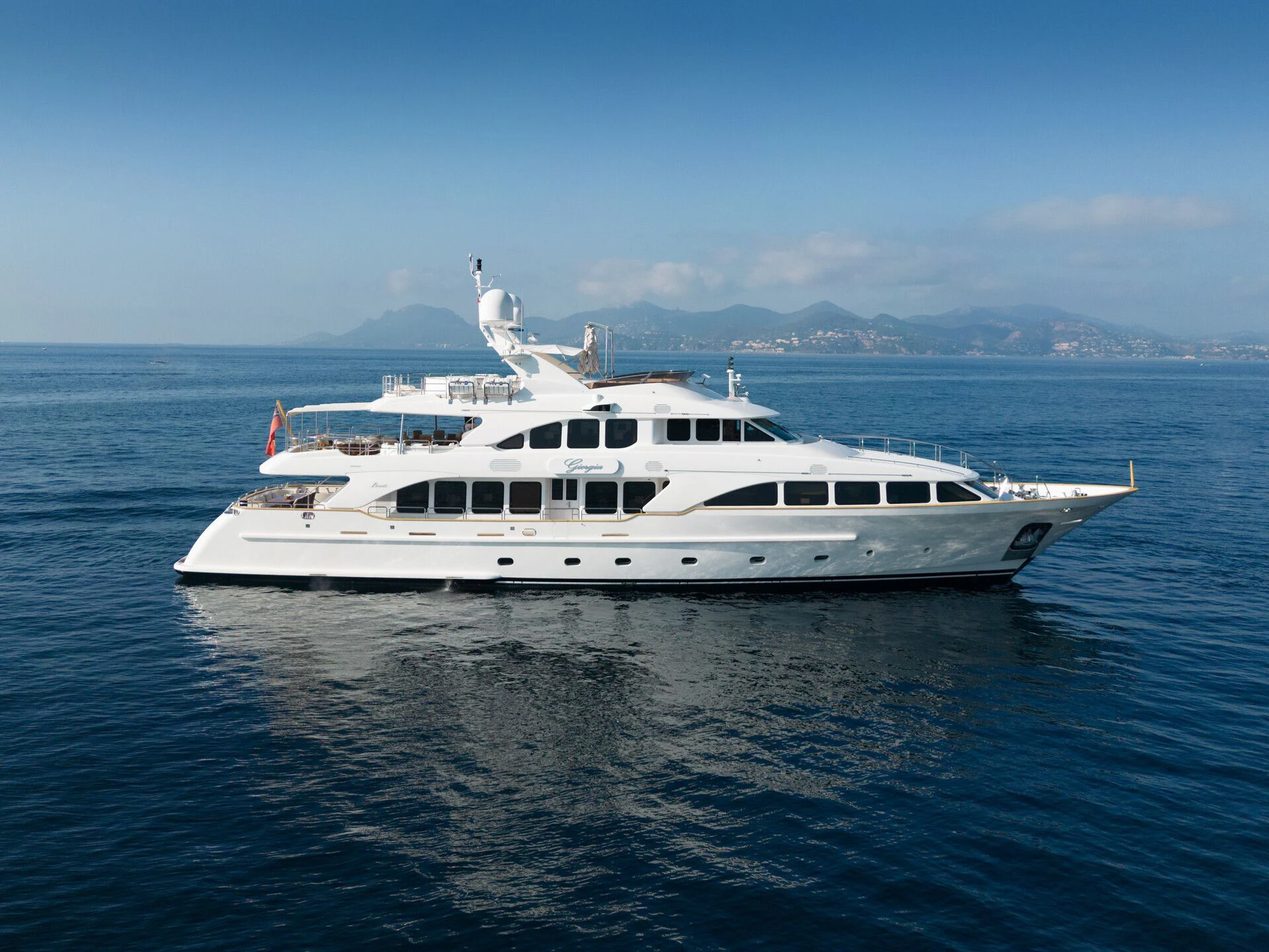 a white yacht in the water aboard GIORGIA I Yacht for Sale