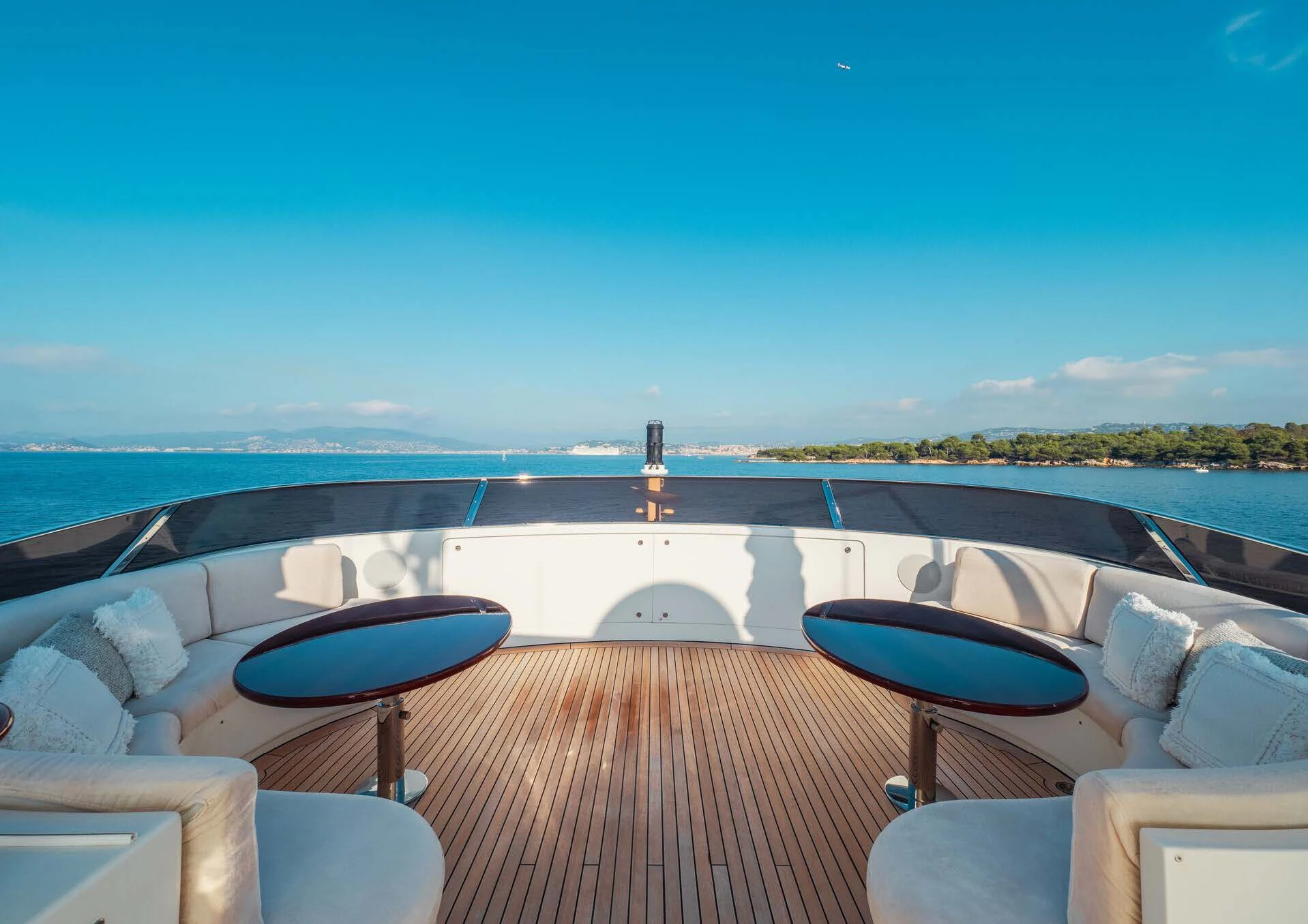 a large deck overlooking a body of water aboard GIORGIA I Yacht for Sale