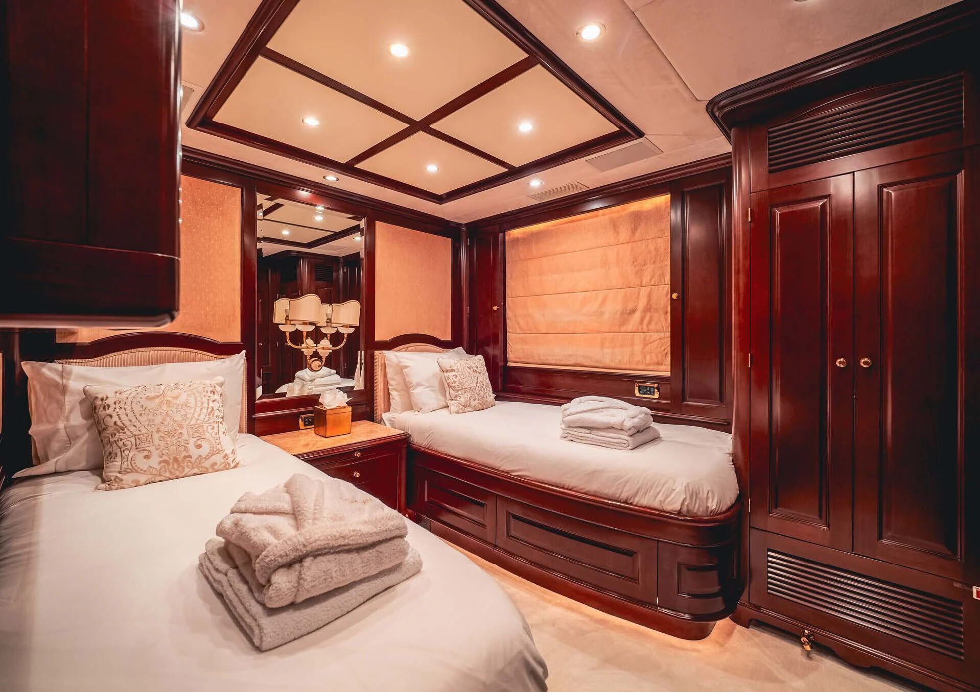 a room with two beds aboard GIORGIA I Yacht for Sale