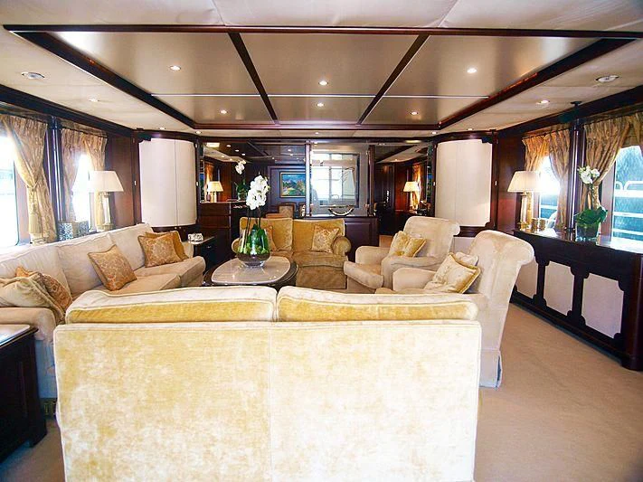 a living room with a large window aboard GIORGIA I Yacht for Sale