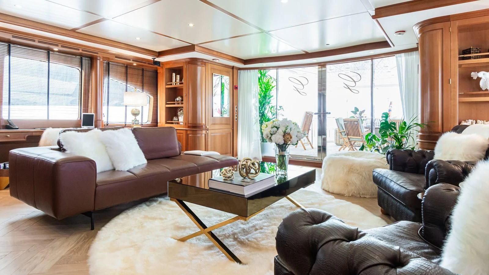 a living room with a large window aboard GIORGIA I Yacht for Sale