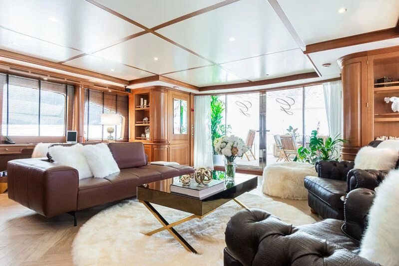 a living room with a large window aboard GIORGIA I Yacht for Sale